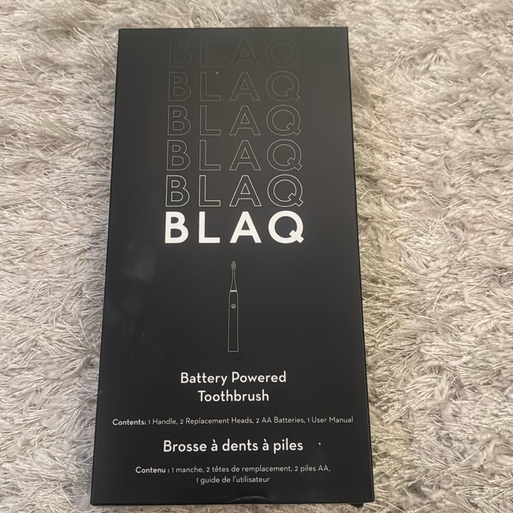 Blaq battery powered toothbrush-brand new/still in box